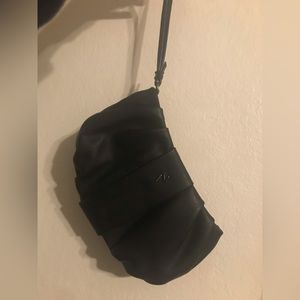 Vera Wang vegan leather clutch bag